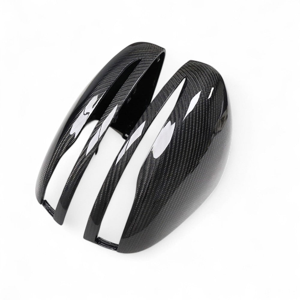 https://cdn.shopify.com/s/files/1/0565/4957/2747/files/coques_retroviseurs_fibre_de_carbone_mercedes_classe_g_W464-4.jpg?v=1762163329