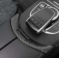Carbon fiber glove box cover Mercedes C-Class W205 - three-quarter view - Becquet Voiture