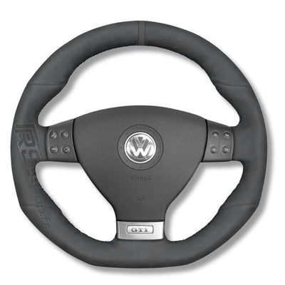 https://cdn.shopify.com/s/files/1/0727/0635/9572/files/couvre_volant_VW_golf_5_alcantara_noir.jpg?v=1754217684