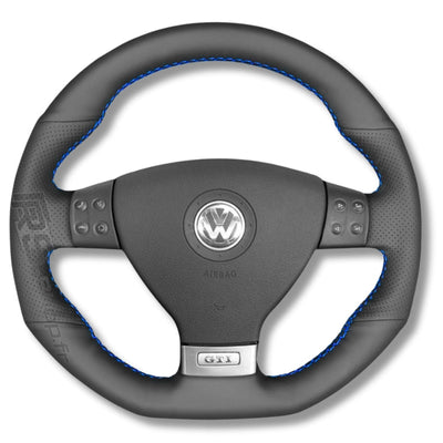 https://cdn.shopify.com/s/files/1/0727/0635/9572/files/couvre_volant_VW_golf_5_cuir_bleu.jpg?v=1754217684