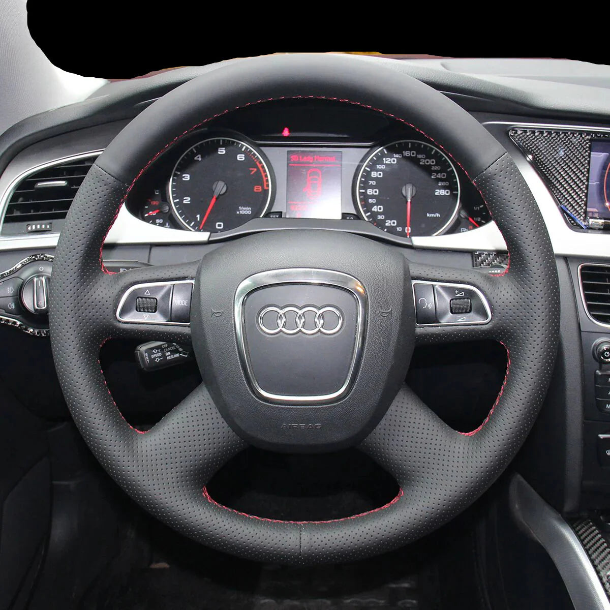 https://cdn.shopify.com/s/files/1/0727/0635/9572/files/couvre_volant_audi_A4_A5_B7_4_branches_cuir.webp?v=1754165373