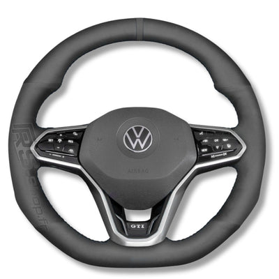 https://cdn.shopify.com/s/files/1/0727/0635/9572/files/couvre_volant_cuir_VW_golf_8_noir.jpg?v=1748858168