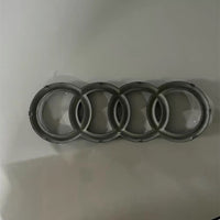 Emblème Audi Lumineux Calandre LED Noir Chromé Dynamique 4 Anneaux - packshot studio - Becquet Voiture