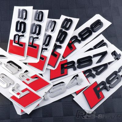 Emblème Badge Audi RS3 RS4 RS5 RS6 RS7 RSQ3 RSQ8 TTRS - packshot studio 4 - Becquet Voiture