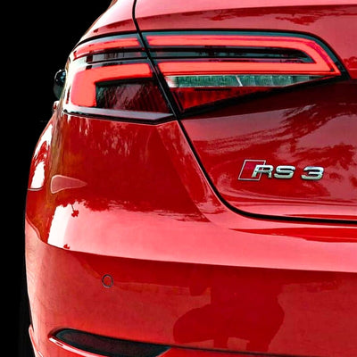 Emblème Badge Audi RS3 RS4 RS5 RS6 RS7 RSQ3 RSQ8 TTRS - vue de dessus 4 - Becquet Voiture