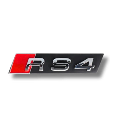 Emblème Badge Audi RS3 RS4 RS5 RS6 RS7 RSQ3 RSQ8 TTRS - vue de trois-quarts 2 - Becquet Voiture