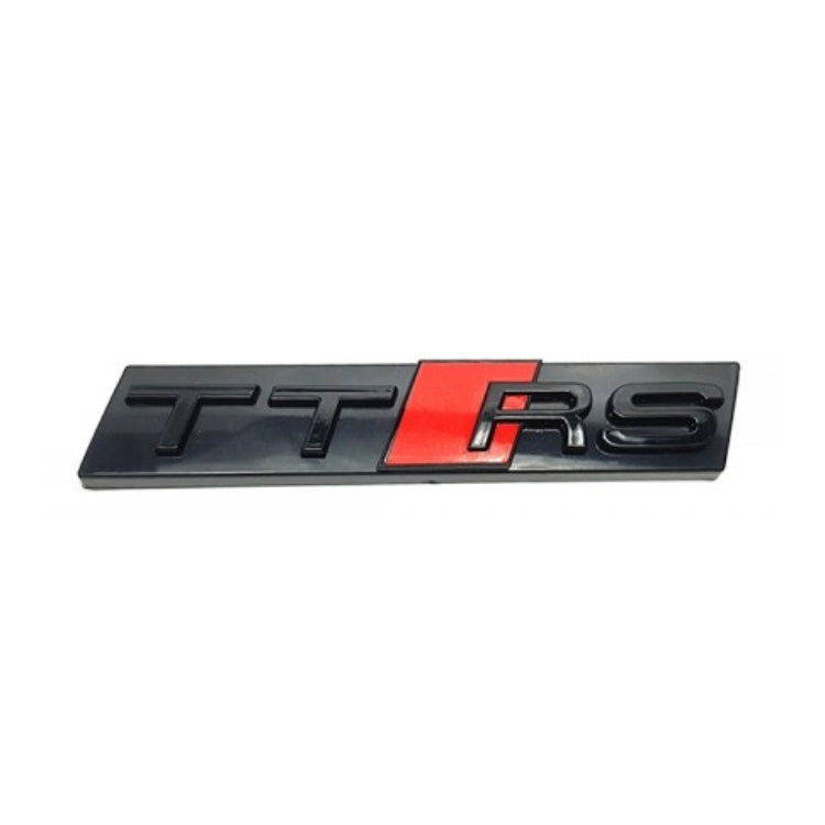 Emblème Badge Audi RS3 RS4 RS5 RS6 RS7 RSQ3 RSQ8 TTRS - vue de trois-quarts 4 - Becquet Voiture