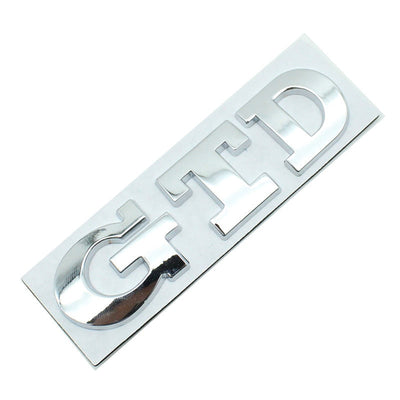 Emblème Badge GTD VW Golf 5 6 7 Avant Arrière - packshot studio 2 - Becquet Voiture
