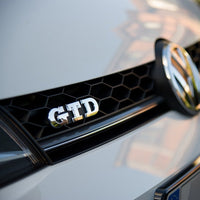 Emblème Badge GTD VW Golf 5 6 7 Avant Arrière - vue de profil - Becquet Voiture