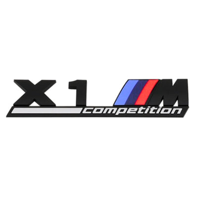 Emblème Badge Logo BMW M Competition Noir Chrome - en situation 2 - Becquet Voiture