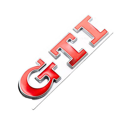 Emblème Badge Logo GTI VW Golf 4 5 6 7 - packshot studio 2 - Becquet Voiture