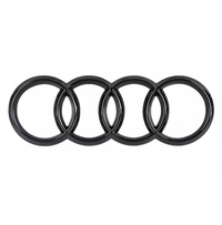 Emblème calandre Audi Black Edition - vue de trois-quarts - Becquet Voiture