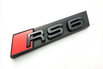 Emblème calandre Audi RS6 noir brillant - vue de profil - Becquet Voiture