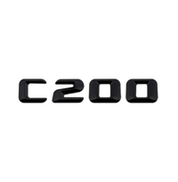Emblèmes De Coffres Noirs Logos Mercedes Classe C AMG C180 - détail du montage - Becquet Voiture