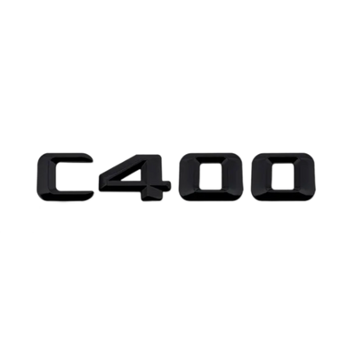 Emblèmes De Coffres Noirs Logos Mercedes Classe C AMG C180 - vue de face 2 - Becquet Voiture