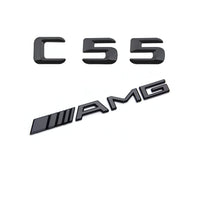 Emblèmes De Coffres Noirs Logos Mercedes Classe C AMG C180 - vue de trois-quarts - Becquet Voiture