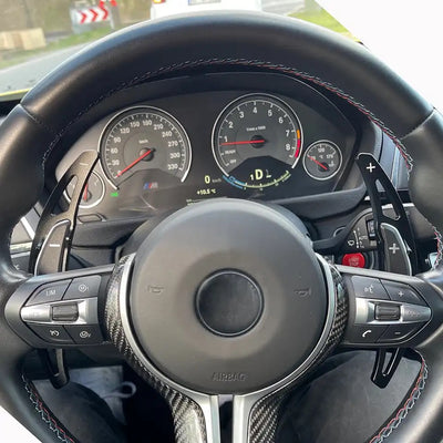Extension palette au volant BMW Génération F - vue arrière - Becquet Voiture