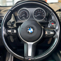 Extension palette au volant carbone BMW Série M Sport - vue arrière - Becquet Voiture