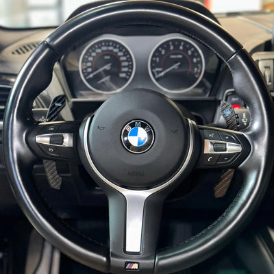 Extension palette au volant carbone BMW Série M Sport - vue arrière - Becquet Voiture