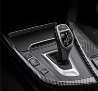 Insert carbone levier BMW Série 1 F20 - vue de face - Becquet Voiture