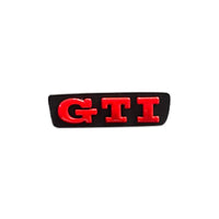 Insert Logo Volant VW Golf 7 GTI R - vue de face - Becquet Voiture