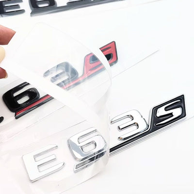 Logo AMG E43 E53 E63S Classe E W213 W214 - vue de trois-quarts - Becquet Voiture