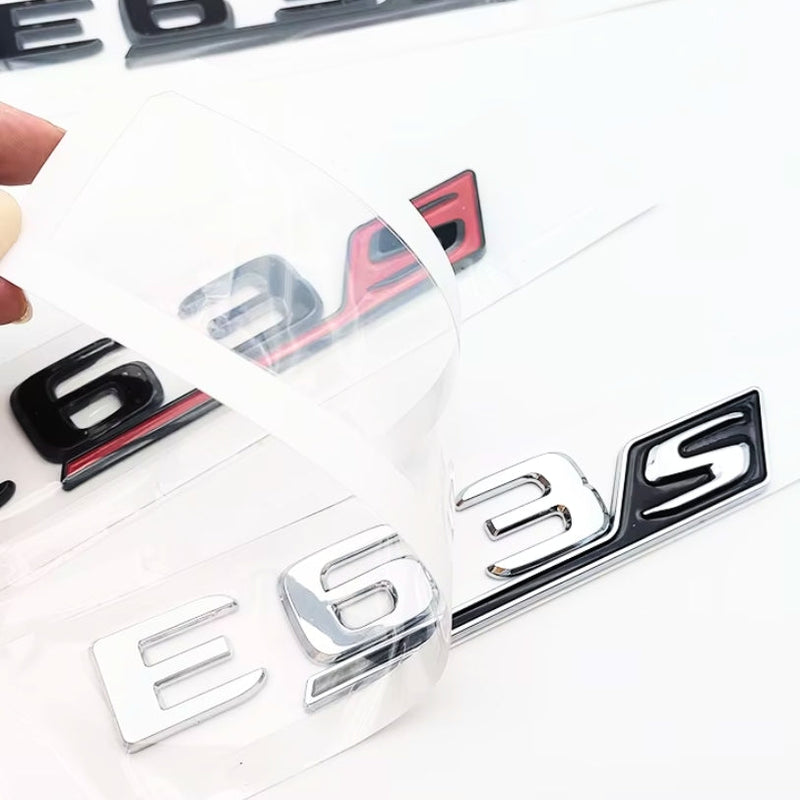 Logo AMG E43 E53 E63S Classe E W213 W214 - vue de trois-quarts - Becquet Voiture