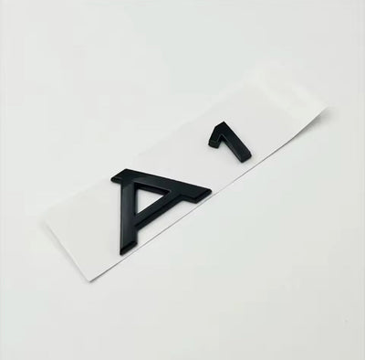 Logo Audi A1 Noir Emblème Arrière 9cm - vue de face - Becquet Voiture