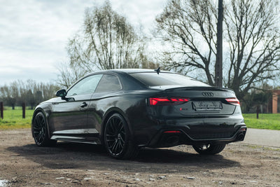 Logo Audi Noir Brillant Toutes Dimensions - vue de trois-quarts - Becquet Voiture