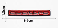 Logo Audi Quattro Emblème Calandre Noir Rouge Chrome - vue de face - Becquet Voiture
