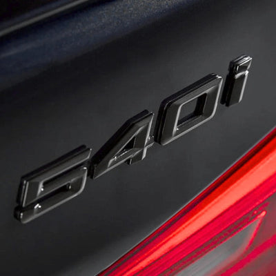 Logo Coffre BMW Série 5 518i à 550i - vue de profil - Becquet Voiture