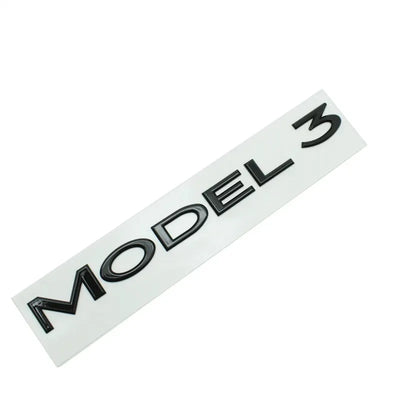 Logo Coffre Tesla Model 3 Y Noir Chrome - packshot studio - Becquet Voiture
