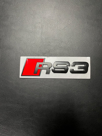 Logo de coffre Audi RS3 noir - vue de face - Becquet Voiture