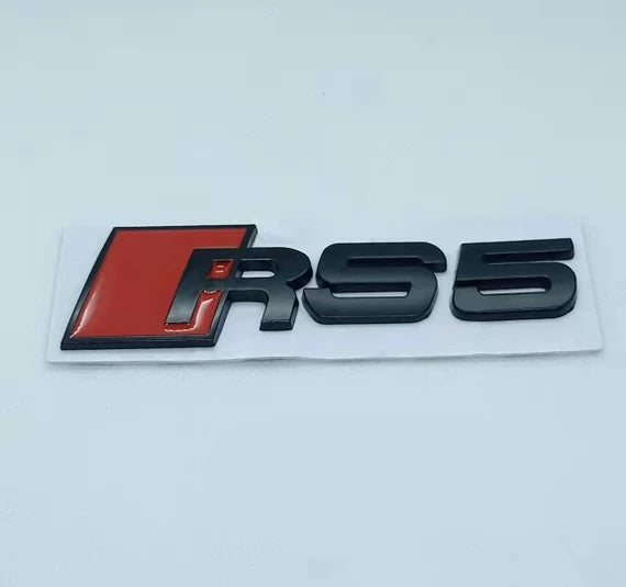 Logo de Coffre Audi RS5 Noir - vue de face - Becquet Voiture
