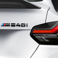 Logo de Coffre BMW Noir Brillant ABS - vue de face - Becquet Voiture