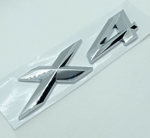 Logo de Coffre BMW X4 Chrome ABS - vue de face - Becquet Voiture