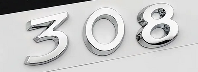 Logo de Coffre Peugeot 308 Noir Argent - vue de profil - Becquet Voiture