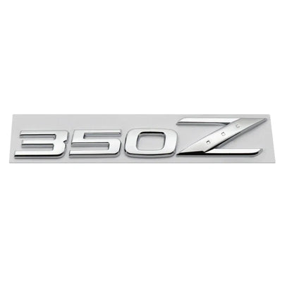 Logo Emblème Nissan 350Z 370Z Fairlady Noir Chrome - en situation - Becquet Voiture