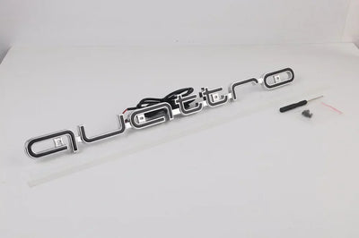 Logo LED Calandre Audi Quattro A3 A4 A6 Q5 Q7 - vue de profil - Becquet Voiture