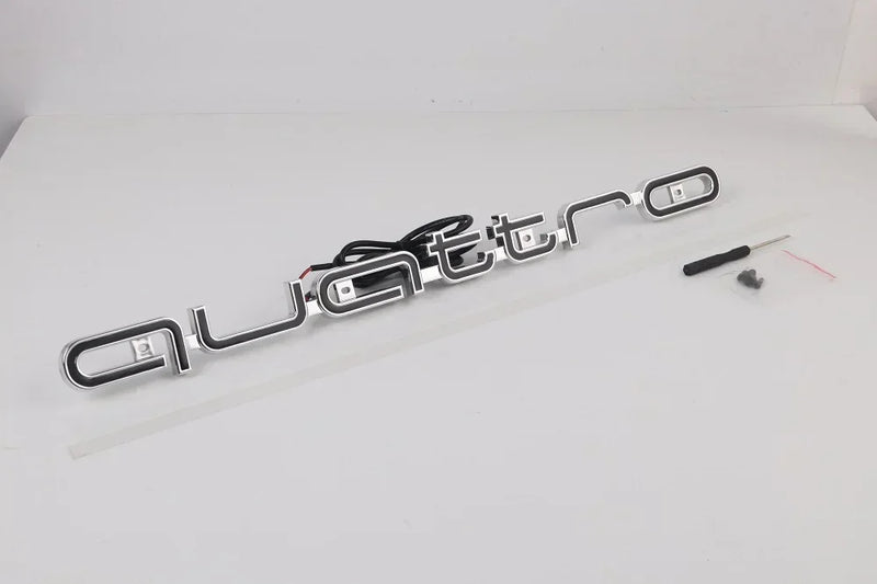 Logo LED Calandre Audi Quattro A3 A4 A6 Q5 Q7 - vue de profil - Becquet Voiture