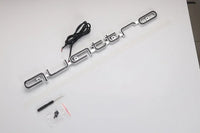 Logo LED Calandre Audi Quattro A3 A4 A6 Q5 Q7 - vue de trois-quarts - Becquet Voiture
