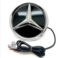 Logo lumineux Mercedes calandre LED - vue de trois-quarts - Becquet Voiture