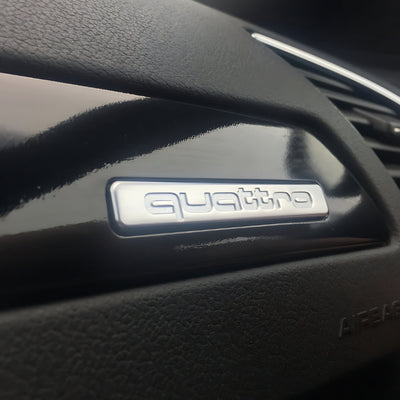 Logo Quattro Audi Emblème Intérieur Plusieurs Tailles - vue arrière - Becquet Voiture