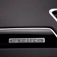 Logo Quattro Audi Emblème Intérieur Plusieurs Tailles - vue de profil - Becquet Voiture