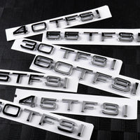 Logo TFSI TSI Audi VW Noir Chrome 20cm - vue de dessus 2 - Becquet Voiture