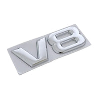 Logo V6 V8 Ford Mustang Noir Chrome - vue de trois-quarts - Becquet Voiture