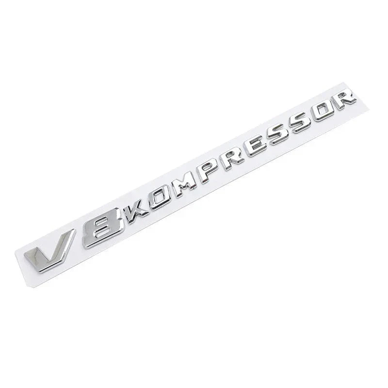 Logo V6 V8 Kompressor Mercedes Noir Chrome - packshot studio - Becquet Voiture