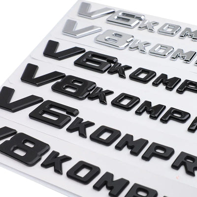 Logo V6 V8 Kompressor Mercedes Noir Chrome - vue arrière - Becquet Voiture