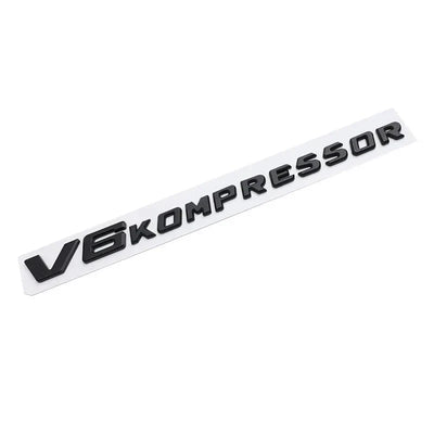 Logo V6 V8 Kompressor Mercedes Noir Chrome - vue de dessus - Becquet Voiture