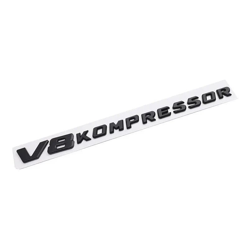 Logo V6 V8 Kompressor Mercedes Noir Chrome - vue de trois-quarts - Becquet Voiture